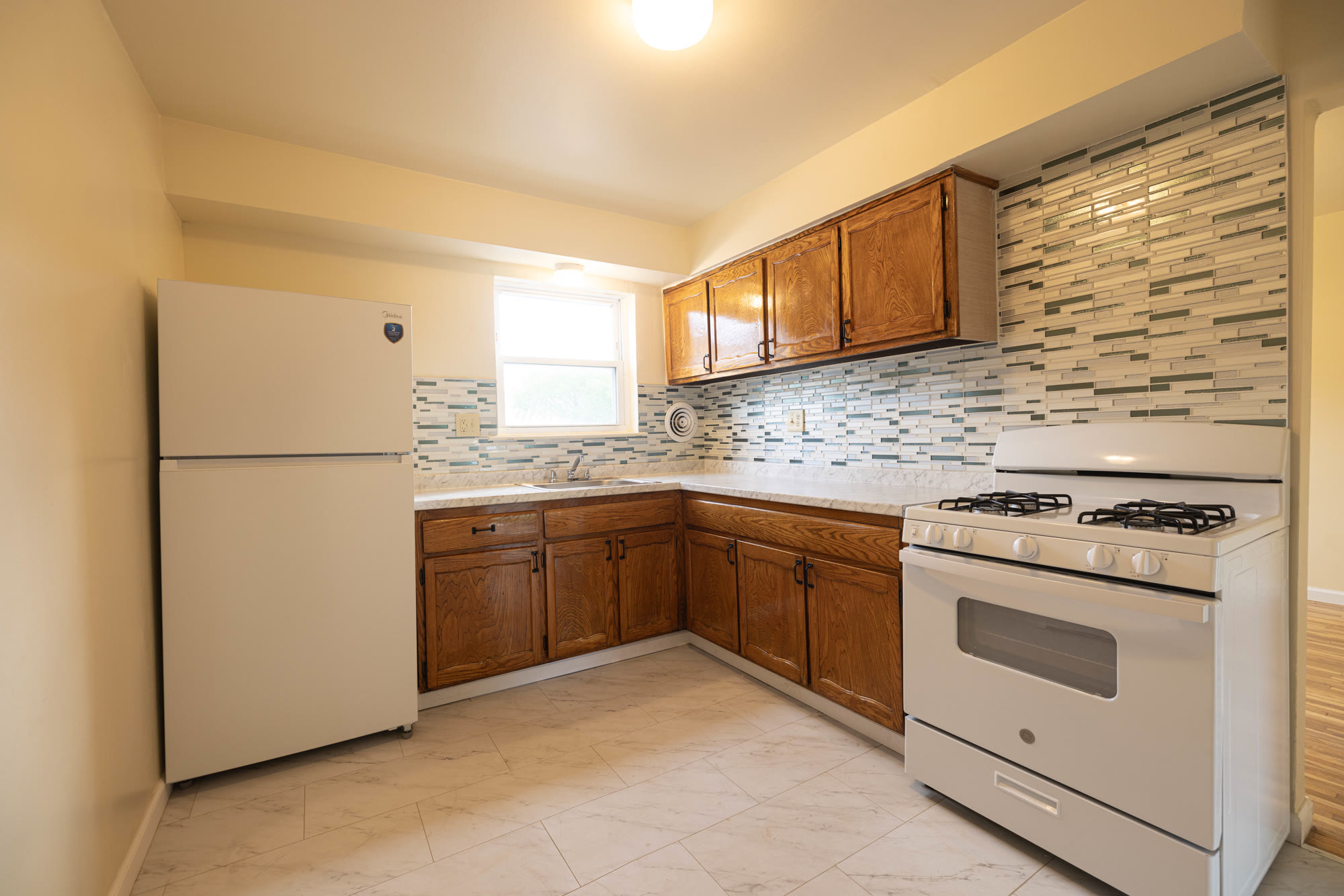 Updated kitchen with oak cabinets